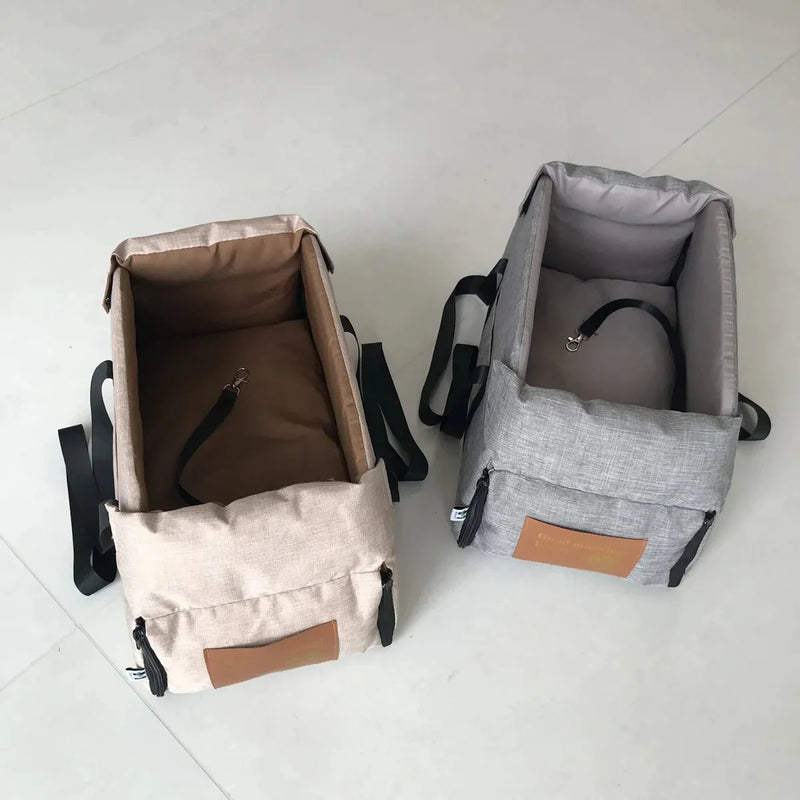 https://cdn.shopify.com/s/files/1/0647/9170/7830/files/panier-de-voyage-chien-pour-accoudoir-8056614.webp?v=1777924934