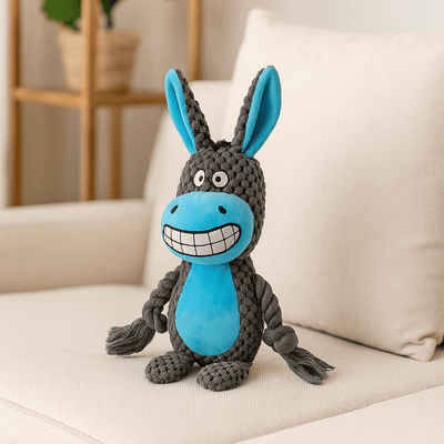 https://cdn.shopify.com/s/files/1/0647/9170/7830/files/peluche-ane-pour-chien-6421200.png?v=1777924267