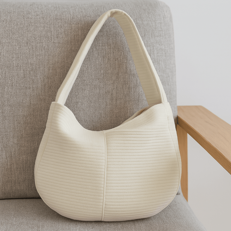 https://cdn.shopify.com/s/files/1/0647/9170/7830/files/sac-a-main-en-canva-pour-petit-chien-3284795.webp?v=1777925348