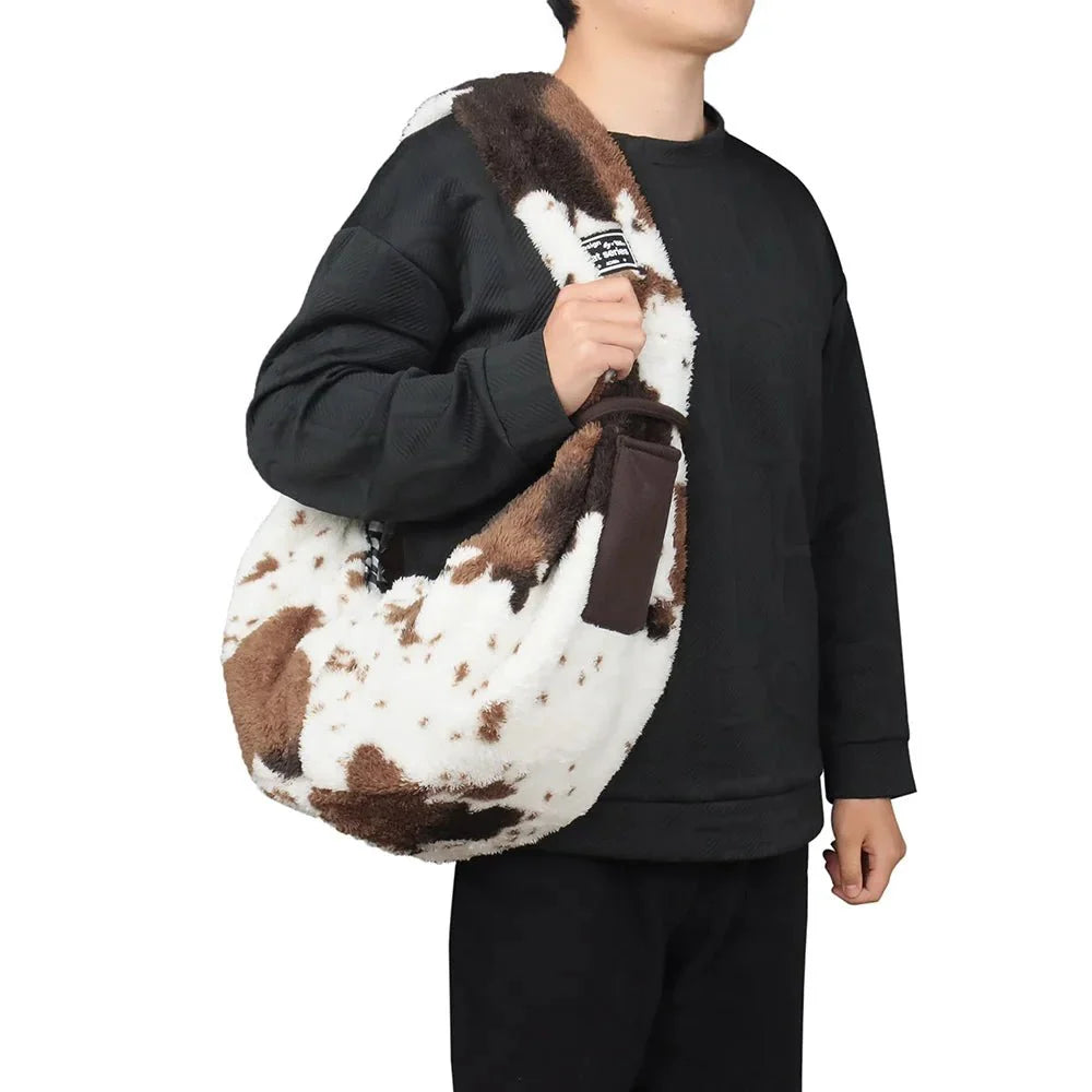 https://cdn.shopify.com/s/files/1/0647/9170/7830/files/sac-en-bandouliere-motif-vache-5146117.webp?v=1777925120