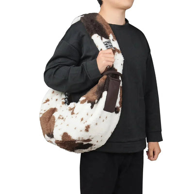 https://cdn.shopify.com/s/files/1/0647/9170/7830/files/sac-en-bandouliere-motif-vache-5146117.webp?v=1777925120