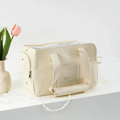 https://cdn.shopify.com/s/files/1/0647/9170/7830/files/sac-pour-transporter-petit-chien-4381390.webp?v=1777923557