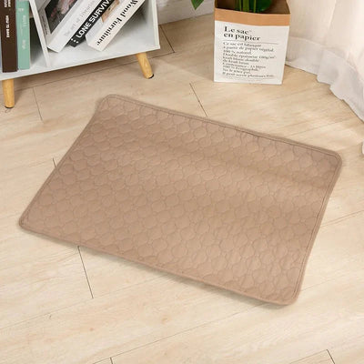 https://cdn.shopify.com/s/files/1/0647/9170/7830/files/tapis-absorbant-et-reutilisable-pour-animaux-5957982.webp?v=1777924938