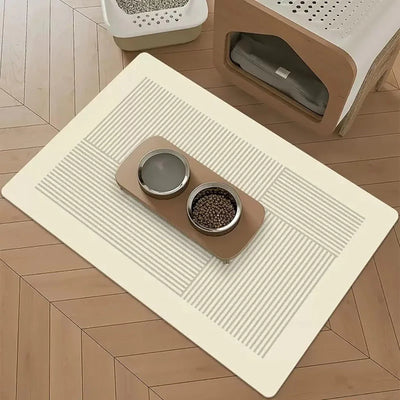 https://cdn.shopify.com/s/files/1/0647/9170/7830/files/tapis-absorbant-pour-gamelle-chien-4942806.webp?v=1777923428