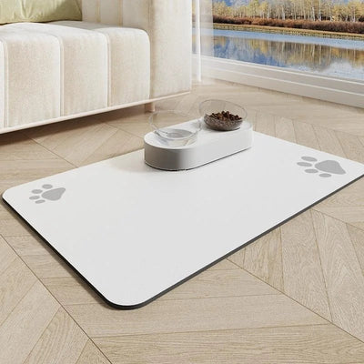 https://cdn.shopify.com/s/files/1/0647/9170/7830/files/tapis-absorbant-pour-gamelles-3245208.webp?v=1777925408