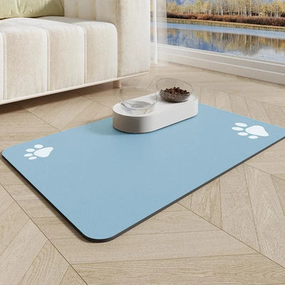 https://cdn.shopify.com/s/files/1/0647/9170/7830/files/tapis-absorbant-pour-gamelles-9736171.webp?v=1777925408