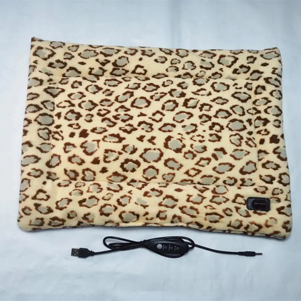 https://cdn.shopify.com/s/files/1/0647/9170/7830/files/tapis-chauffe-leopard-9426765.webp?v=1777924868