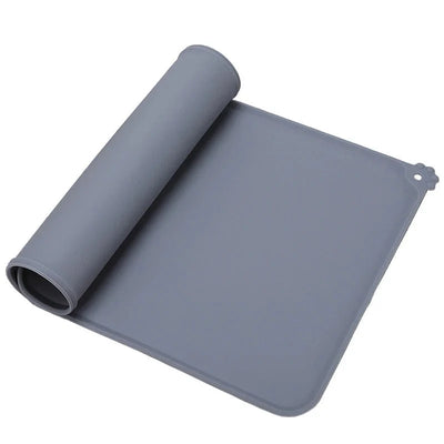 https://cdn.shopify.com/s/files/1/0647/9170/7830/files/tapis-pour-gamelles-7663038.webp?v=1777925354